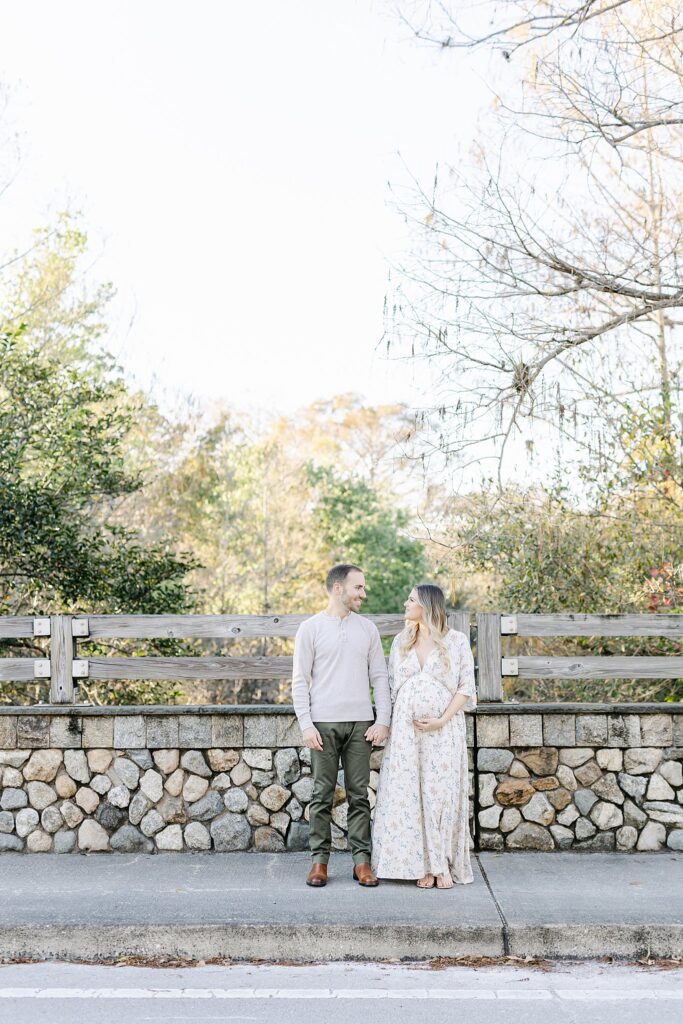 Expecting parents during a sunset maternity session in Palm Beach Gardens — captured by a full-service maternity photographer who offers styling and wardrobe guidance.