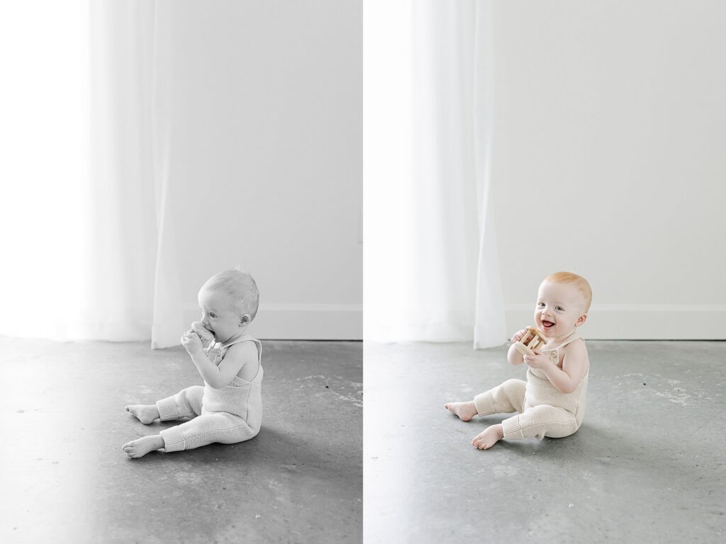 Baby sitting independently on a neutral backdrop during a professional milestone session.